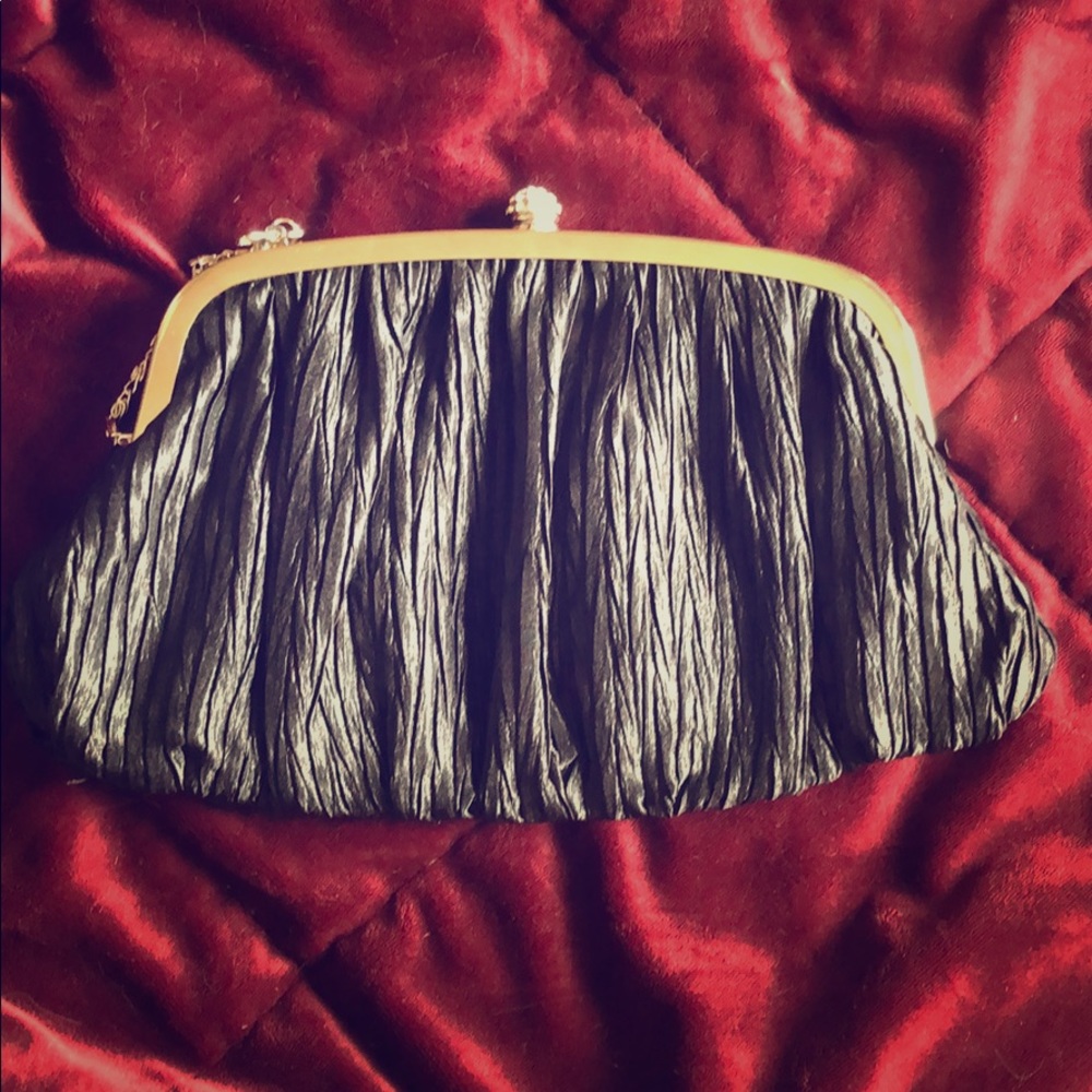 Black clutch with studded clasp
